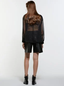 Camicia nera trasparente con tasconi