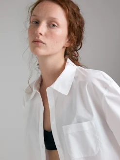 Camicia svasata con pieghe