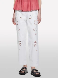 Pantaloni bianchi con ricami