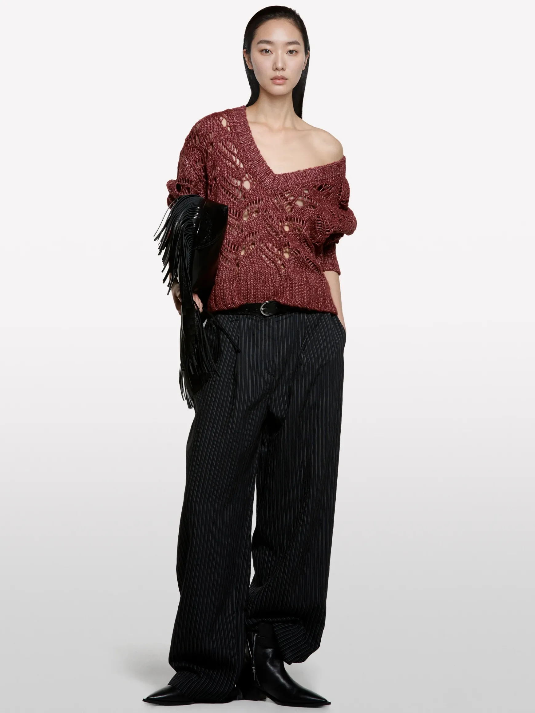 Pantaloni neri rigati